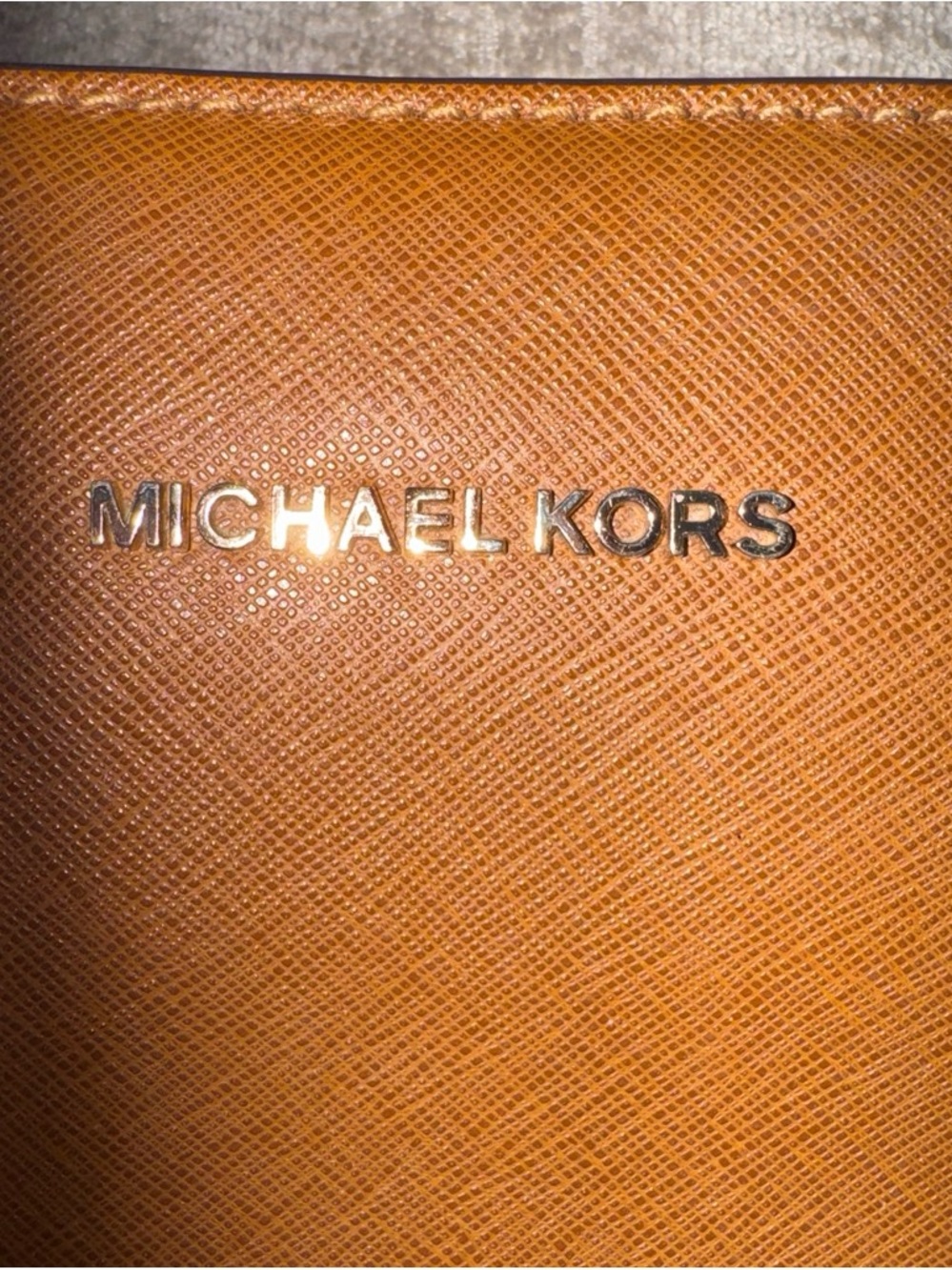 Michael Kors Cognac Saffiano Leather messenger bag with gold hardware